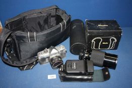 A Minolta SR-1 35mm SLR Camera with a Minolta Auto Rokkor - PF 55mm f/1.