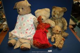 Five old soft toys including a jointed Teddy with one glass eye, one with a bell in the ear,