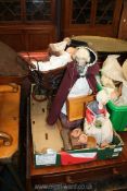 A reproduction vintage dolls pram with baby doll,