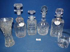Four cut glass Decanters, two with enamel drinks labels, one badly chipped to the rim,