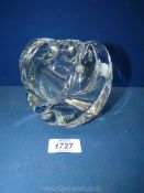 An Orrefors heavy crystal glass vase with thick rounded spiral effect,