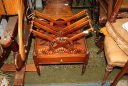 A Mahogany Canterbury with 'x' shape compartments and wreath and ribbon facings,