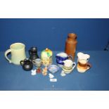 A small quantity of mixed pottery including dragon pottery jug, Prinknash jugs,