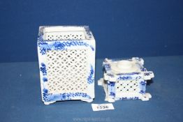 A blue and white oriental reticulated square pot ,