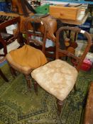 A pair of circa 1900 side Chairs having turned and fluted front legs.