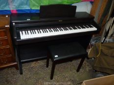 A dark Rosewood finished Roland HP237e Digital Piano having a 6 1/2 octave keyboard and complete