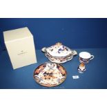 Three pieces of Imari pattern china,