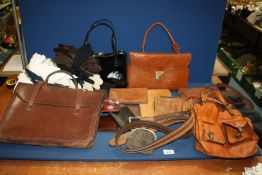 A quantity of Leather items to include music case, wallets, ladies gloves and four leather handbags.