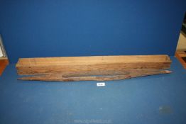 An antique model of a Polynesian canoe hull, hand carved and decorated by tribal craftsman,