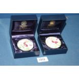 Two boxed Royal Worcester Halcyon Days enamel and metal trinket boxes.