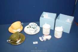 A quantity of china to include 'Elizabethan' cups and saucers in yellow floral and green and pink