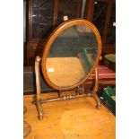 A dressing table Mirror with scrolled feet, 20 1/2" wide x 28" high.