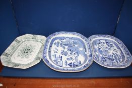 A willow pattern turkey Plate (one stay missing), similar meat plates and one other.