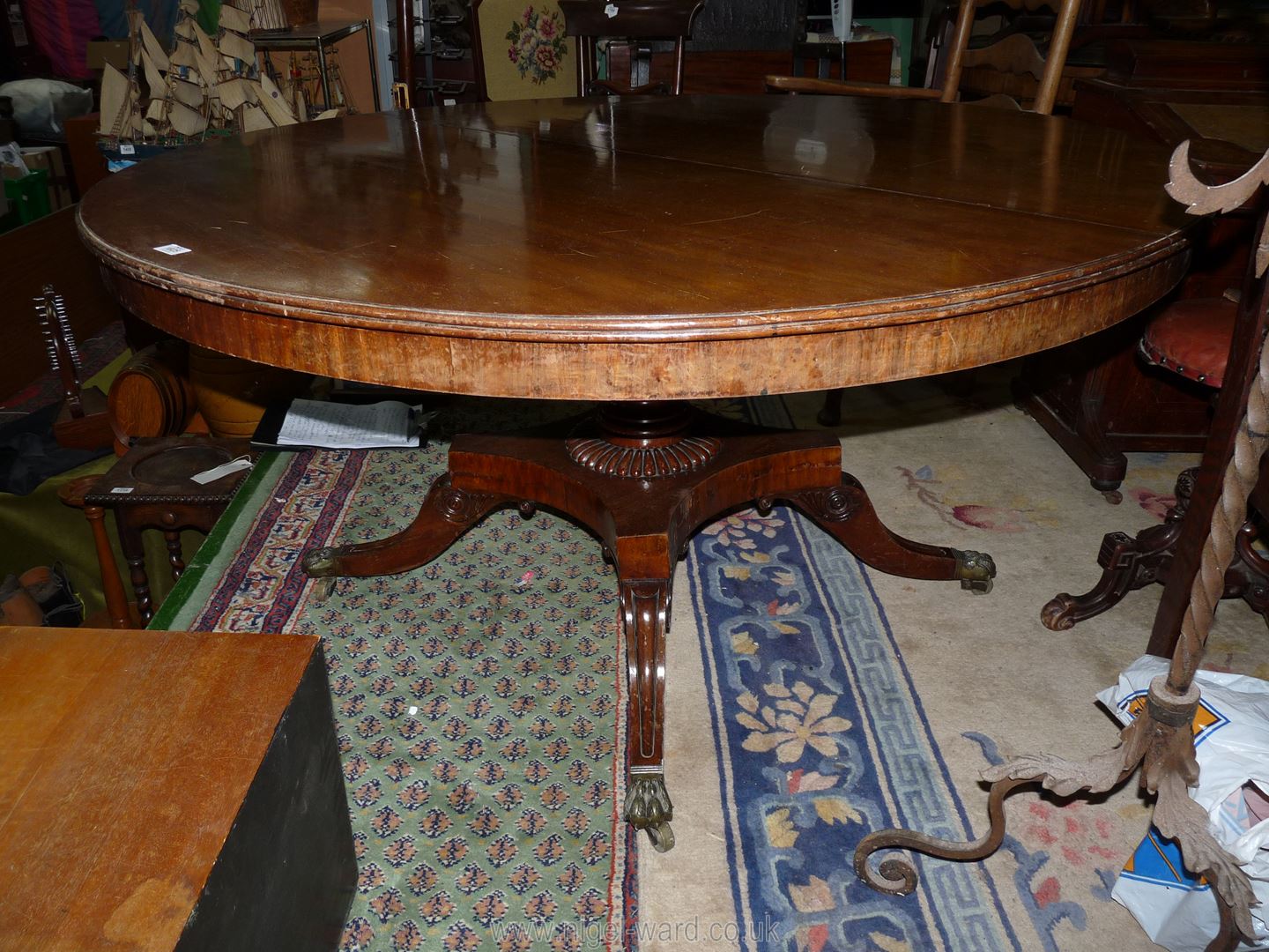 A Regency Mahogany snap-top Hall/Centre Table standing on a turned and lobed column on a platform - Image 2 of 6