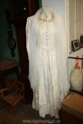 An ivory silk wedding Dress by Sally Stade of Regent Street, size M,