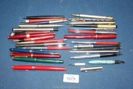 A quantity of pens to include Parker, Osmiroid, Conway Stewart etc.