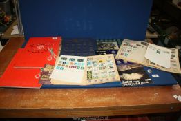 Two Stanley Gibbons stamp albums and contents plus Man in Flight, Historic Cars,