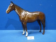 A Beswick Bay Horse with two white socks.