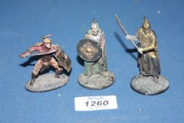 Three miniature "Lord of the Rings" figures including Elven Warrior.