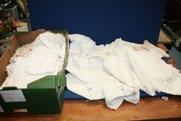 A quantity of linen including embroidered place mats, lace tablecloths, damask, etc, (some marked).