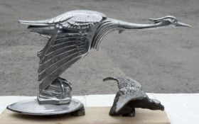 Two white metal Car Mascots - flying stork, 7'' tall and eagle, 3'' tall.