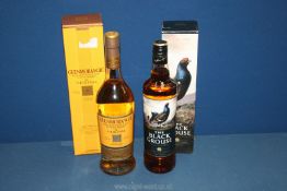 A bottle of Glenmorangie single malt whisky and a bottle of Famous Grouse whisky, both 70 cl.