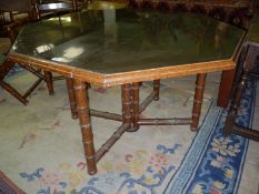 An unusual narrow dropleaf highly polished top Dropleaf Table standing on bamboo effect legs,