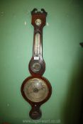 A banjo Barometer/thermometer, with Merthyr plaque, 38'' tall,