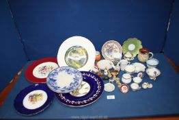 A quantity of china to include; Royal Worcester display plates, Wade Whimsies,