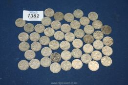 A good quantity of six pence pieces including two George V.