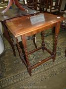 A 1930/40's rectangular medium Oak occasional Table standing on mirrored twist legs with perimeter