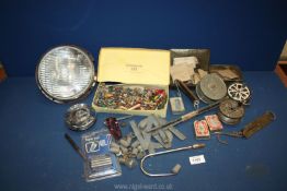 A box of miscellanea to include; vintage headlight, fishing reel parts, collection of centre pins,