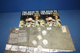 A commemorative set of six Coins "The Road to Victory 1939-1945" including crowns and half crowns,