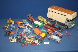 A small quantity of model farm vehicles and machinery including Triang Stockbox,