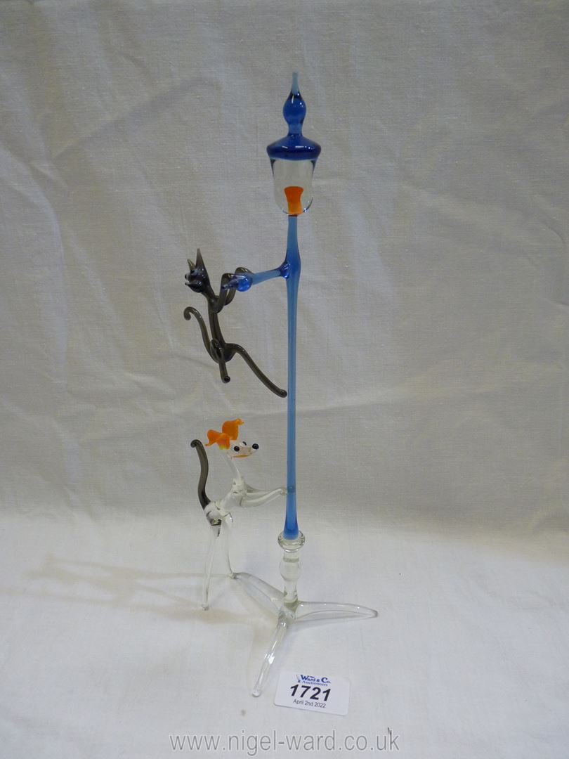 A coloured glass sculpture of dog chasing cat up lamppost. - Image 4 of 4