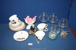 A quantity of mixed china including foreign cups, saucers and plates, fishermen figurine,