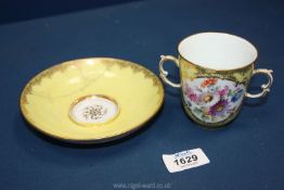 A pretty Meissen chocolate cup decorated with floral panel to one side and scene with figures on