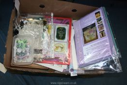 A quantity of craft card, 'Design at Your Fingertips' embossing board sets etc.