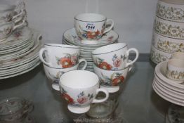 A set of Wedgwood 'Philippa' bone china including, six each of teacups, saucers and tea plates.