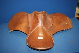 A brown leather Pony Saddle