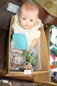 An old Baby Doll with blue glass eyes, marked 201-7 Germany to the back of the neck,