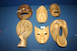 A quantity of Treen masks