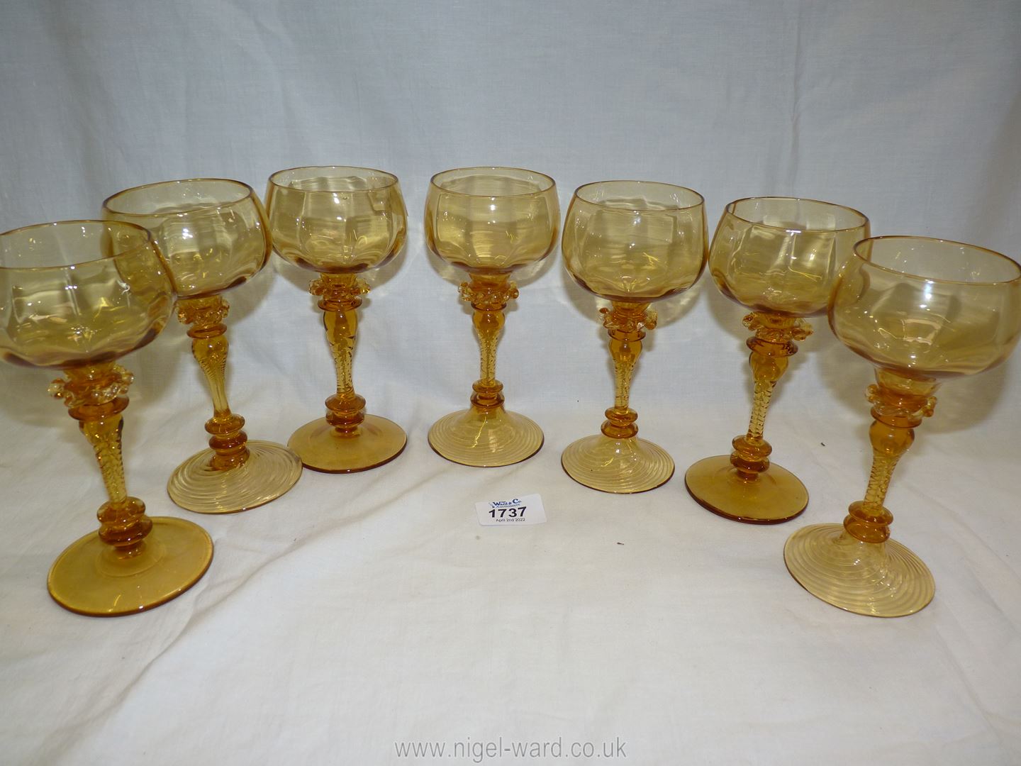 A set of seven fine Venetian amber coloured glass hock glasses. - Image 3 of 4