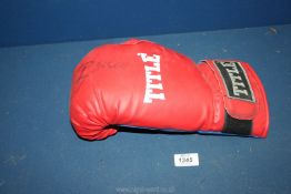 A Boxing Glove with the signature of Russell Crowe,