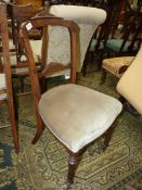 A circa 1900 Walnut framed side Chair having over-stuffed olive green fabric upholstered seat and