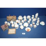 A quantity of Goss crested china including two cottages,