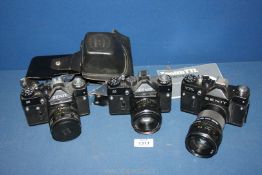 Three Zenit 35mm SLR Cameras comprising Two Zenit 11's both having a Helios 58mm f/2 Lens,
