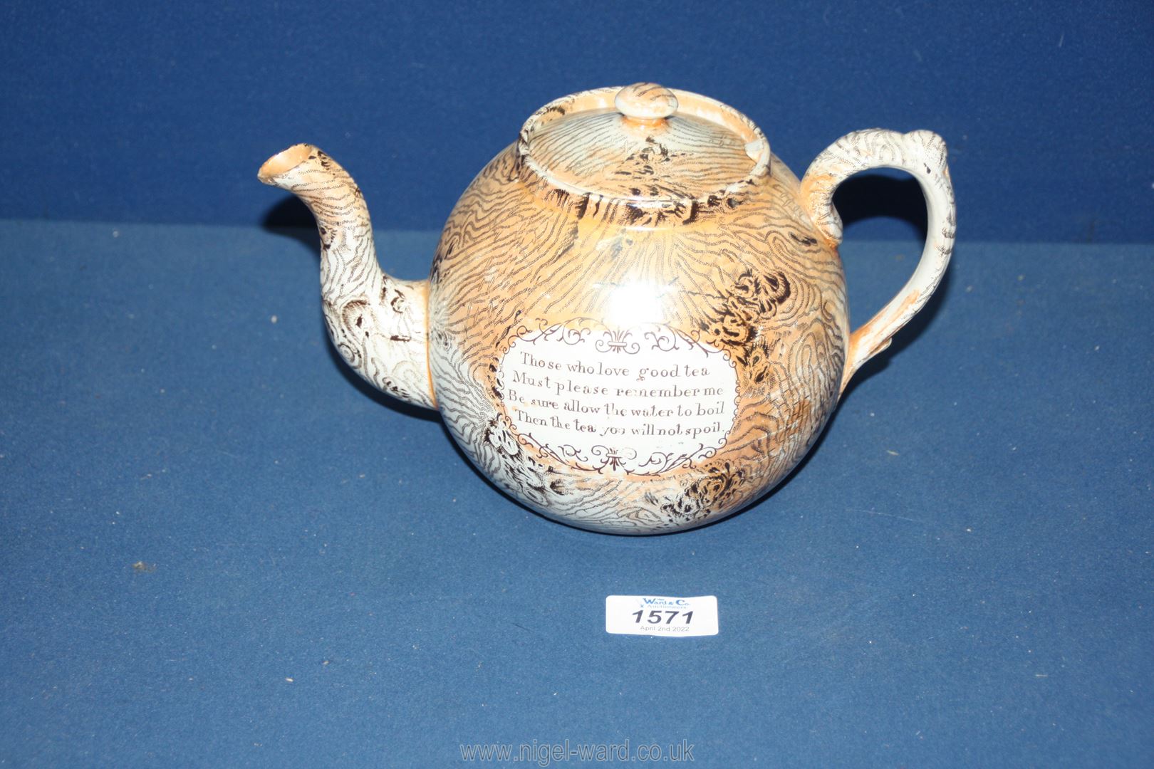 A Staffordshire scumble lustre Teapot mid 19th century with mottos 'Happy may you be' and 'Those