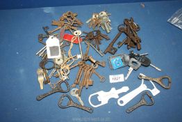 A packet of mainly vintage bottle openers and a bag of over 100 vintage and antique keys.