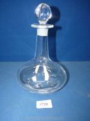 An Orrefors crystal glass decanter having six ovoid dimples around base forming 'Snowflake' effect